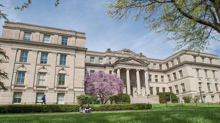An image of Schaeffer Hall on the University of Iowa campus in spring